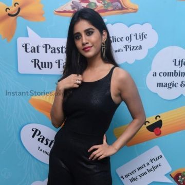Nabha Natesh Latest Hot HD Photos in Black Sleeveless Dress